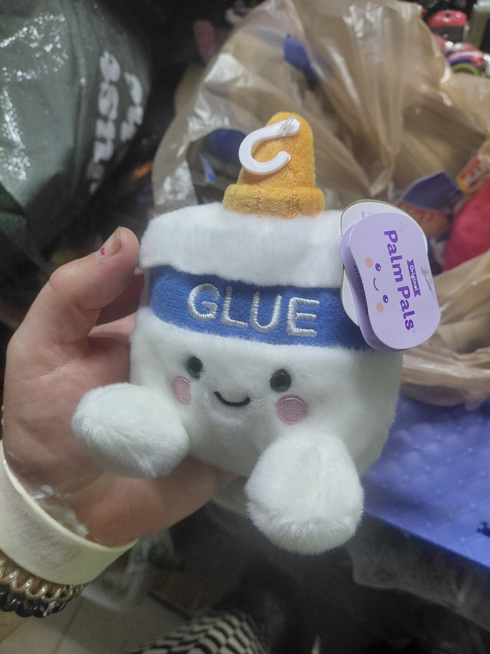 the Aurora Palm Pals 5-inch "Gooey Glue" plush toy